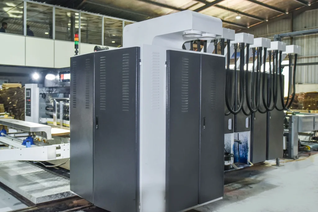 Automated corrugated packaging manufacturing machine inside EZI Packaging factory in Sri Lanka