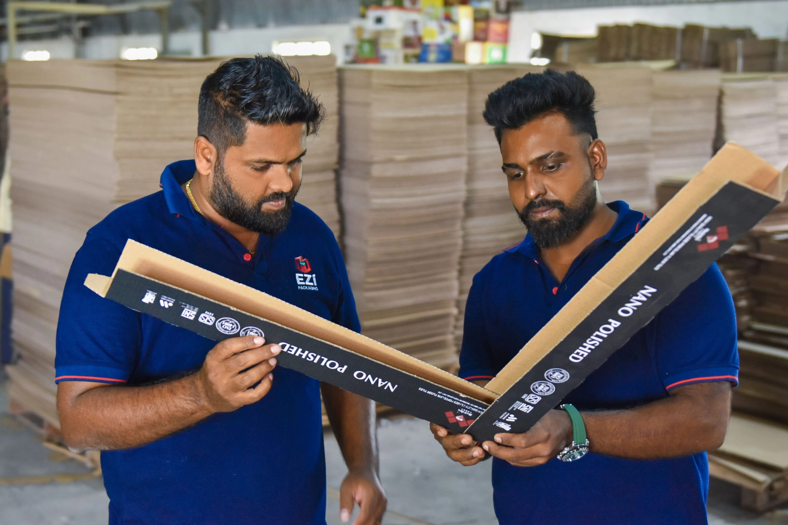 EZI Packaging team inspecting corrugated packaging design and product quality in Sri Lanka factory